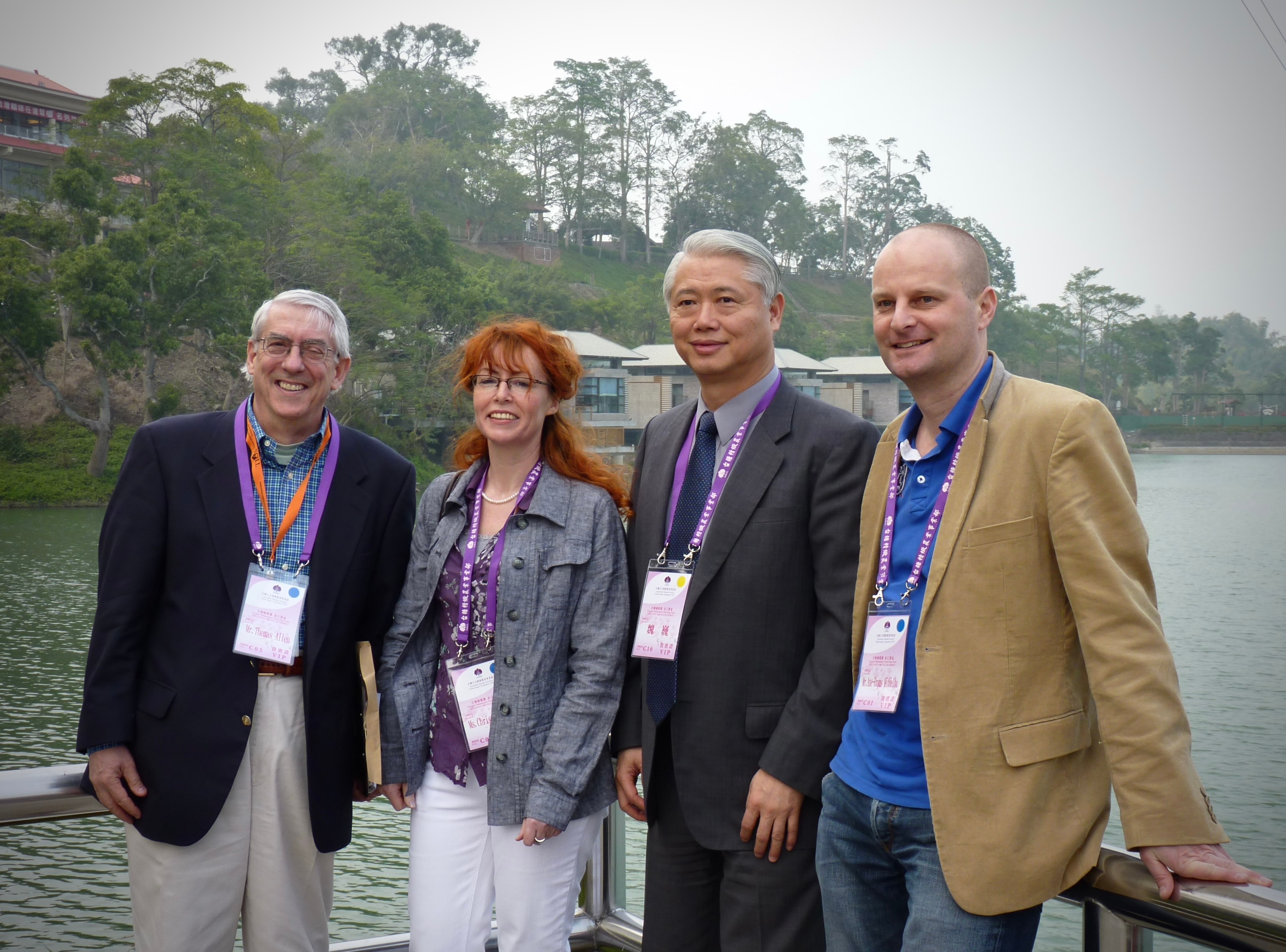 International press group at a lakeside pavilion during the Taiwan Flora Exposition, 2011
